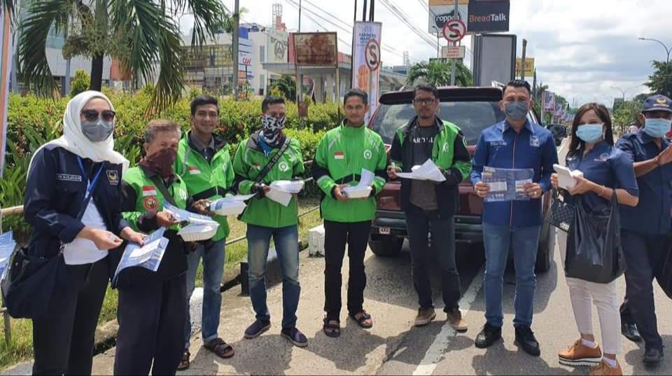 Nasdem Sumsel Bagikan 1000 Nasi Kotak dan Hand Sanitizer